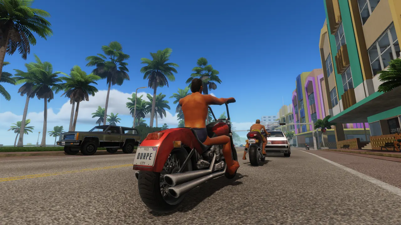Two reworked motorbikes and a pickup on Ocean Drive, with chrome exhausts and a readable Vice City number plate